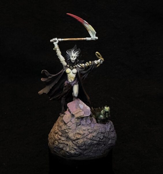 Woman with scythe