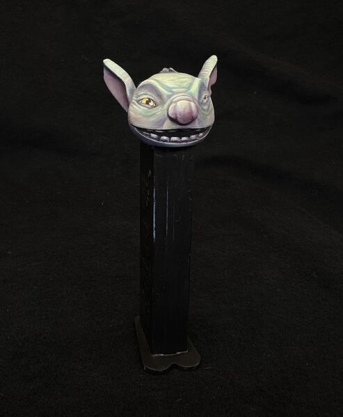 Toothy goblin has candy for you